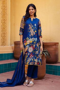 Blue kurta with hand painted fisherman kalamkari motifs and triangle lace detailing. Paired with a co-ordinating triangle lace detailing straight pant and dupatta with embroidered scallop border. - Aza Fashions Blue Straight Kurta Set With Kalamkari Print, Blue Sets With Printed Motifs In Traditional Drape, Blue Chanderi Lawn Suit With Printed Motifs, Blue Mulmul Salwar Kameez With Kalamkari Print, Blue Unstitched Dupatta With Printed Motifs, Blue Lawn Suit With Printed Motifs For Diwali, Blue Unstitched Salwar Kameez With Kalamkari Print, Blue Mulmul Palazzo Set With Printed Motifs, Unstitched Blue Salwar Kameez With Kalamkari Print