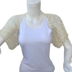 This Ivory Bridal Bolero Shrug is a perfect accessory for your summer outfit. It gives an elegant silky touch and is proper for the late spring and the summer months. Be the star at the dancing with this lightweight loose shrug. It matches perfectly with an evening dress as well over a party top.   This bolero is quite stretchy. Ask for a Custom order to fit exactly your size ot choose it according to the measures given below. It is available in Plus size also. Please contact us to send us your White Party Shrug For Spring, Fitted Summer Wedding Shrug, Fitted Shrug For Summer Wedding, Summer Wedding Fitted Shrug, Elegant Fitted Summer Shrug, White Fitted Shrug For Evening, Elegant Summer Party Shrug, White Fitted Evening Shrug, Elegant Spring Wedding Shrug