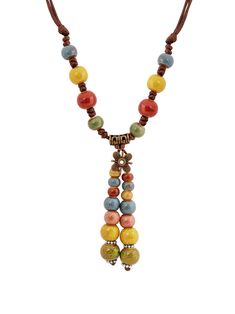 PRICES MAY VARY. Beautiful boho necklace features a unique combination of ceramic beads in various shapes, sizes and colors Easy to wear with an adjustable sliding brown waxed cord, just put over the head and you're ready to go Give this stunning piece of bohemian jewelry as a great Valentine's Day, Christmas, birthday, or anniversary gift A nice addition to any jewelry collection that surely makes you stand out from the crowd in style If there is any problem with your purchase, feel free to contact us and we'll sort it out immediately Boho Jewlery, Ceramic Beads Necklace, Bohemian Flower, Bohemian Flowers, Ceramic Necklace, Trending Necklaces, Fiber Jewelry, Y Necklace, Art Fabric