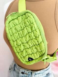 Don't let the summer heat slow you down - stay stylish and hands-free with our Quilted Belt Bag in lively lime! Inspired by lulu dupes, this bag is a summer essential that adds a playful touch to any outfit. The quilted design not only looks chic, but also adds extra durability for all your adventures. Trendy Summer Shoulder Bag For On-the-go, Trendy Summer Bags For On-the-go, Summer Green Shoulder Bag For On-the-go, Trendy Green Quilted Shoulder Bag, Trendy Light Green Bag For Everyday Use, Green Quilted Shoulder Bag For Travel, Quilted Green Shoulder Bag For Travel, Trendy Quilted Shoulder Bag For Spring, Trendy Green Shoulder Bag For On-the-go