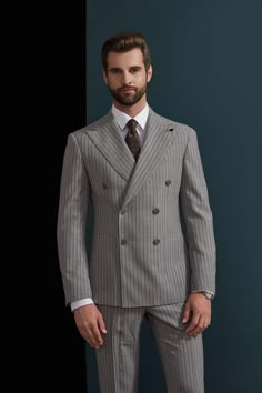 This ash and charcoal pinstripe suit for men or women is an nice addition to office wear or professional events. With the elegance of the grey stitching, this suit will pair well with many color varieties making it a suit that can be worn in any season and any setting. Like this look, but want to make some changes? Chat with a stylist or book an appointment. FREE SHIPPING ON ORDERS OVER $199 COLOR Grey COMPOSITION 100% Wool YARN COUNT Super 120s WEIGHT 290g FABRIC STYLE Pinstripe OCCASION Busine Striped Tuxedo Suit For Business, Elegant Pinstripe Suit With Suit Collar, Formal Pinstripe Double Breasted Suit With Notch Lapel, Pinstripe Double Breasted Suit With Suit Collar For Semi-formal, Pinstripe Double Breasted Suit With Notch Lapel, Pinstripe Double Breasted Business Casual Suit, Pinstripe Double Breasted Suit For Business Casual, Pinstripe Tuxedo Suit, Elegant Gray Double Breasted Suit For Semi-formal Occasions