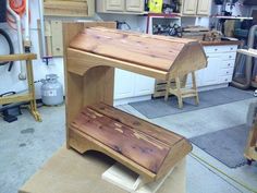 a workbench made out of wood in a garage