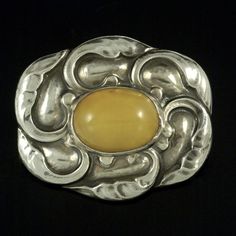 Georg Jensen. Art Nouveau Sterling Silver Brooch with Amber #61. 1933-44.  | eBay Georg Jensen Jewelry, Creative Craft, Sterling Silver Brooch, Casting Jewelry, Georg Jensen, Silver Brooch, Creative Crafts, Metal Jewelry, Brooches