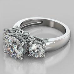 two engagement rings with diamonds on them