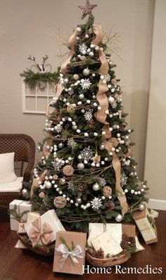 a decorated christmas tree with presents under it