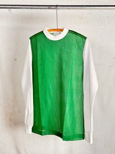 An authentic vintage blank sports jersey. long sleeve with elbow patches. era : 1970s 80s material : 100% nylon color : true green, white condition : deadstock, new and unworn as seen in photos size : tagged adult medium , please compare measurements below actual garment measurements : chest : 20" pit to pit   shoulder : 17.5" sleeve : 27.5" length : 29" - - - - - - - - - - - - - - - - - - - - - - - - - - - - - - - - - - - - - - - -  INTERNATIONAL SHIPPING AVAILABLE UPON REQUEST Craft Union does NOT accept returns or exchanges, all items are FINAL SALE Please consider the following prior to placing an order : Because measurements are provided, Craft Union does NOT grant refund/exchange requests if an item does not fit. We are always happy to assist interest buyers with any size/fit concern Green Sporty Long Sleeve Top, Retro Green Tops For Sports, Retro Green Sports Top, Retro Long Sleeve Top For Sports Events, Jersey Long Sleeve, Elbow Patches, Vintage 1970s, True Vintage, Long Sleeve T Shirt