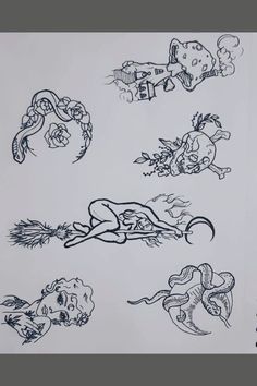 several different tattoo designs on a sheet of paper