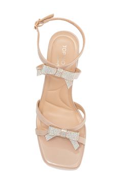 A chunky block heel elevates this party-ready sandal that's topped with slender straps and shimmering with crystallized bows. 3 1/2" heel; 3/4" platform Synthetic upper, lining and sole Imported Party Heels With Bow Straps And Block Heel, Glamorous Open Toe Heels With Bow Straps, Party Sandals With Bow Straps, Glamorous Summer Heels With Bow Straps, Block Heel Sandals With Bow For Prom, Glamorous Bow Sandals For Night Out, Prom Sandals With Bow And Block Heel, Glamorous Synthetic Block Heels For Party, Party Low Heel Block Heels In Synthetic