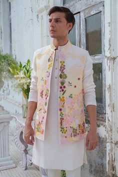 Multicolor bundi with thread embroidery in floral pattern. Paired with ivory kurta and trouser. - Aza Fashions Unstitched Nehru Jacket With Resham Embroidery For Spring, Designer Spring Nehru Jacket With Floral Embroidery, Spring Designer Nehru Jacket With Floral Embroidery, Traditional Sherwani With Intricate Embroidery For Spring, Traditional Spring Sherwani With Intricate Embroidery, Traditional Fitted Nehru Jacket For Spring, Designer Sherwani For Spring, Spring Designer Embroidered Sherwani, Unstitched Chikankari Embroidery Nehru Jacket For Spring