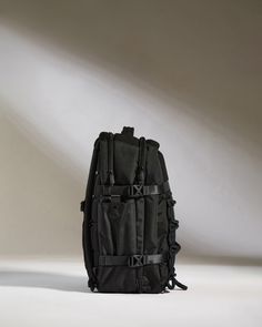 Make a seamless transition from weekdays to weekends with our Discovery Backpack. Offering a generous 28L packing capacity for work, play and every journey in between, the streamlined back-sleeve slots over your suitcase handle for hands-free carrying. Crafted from fully recycled polyester, this lightweight and durable travel companion features twisted ripstop reinforcement, ensuring it withstands the rigors of daily travel and water-resistant protection for peace of mind in wet weather. Designe Practical Nylon Backpack For Trips, Large Capacity Nylon Backpack For Trip, Functional Large Capacity Standard Backpack Luggage, Nylon Laptop Bag Backpack With Large Capacity, Nylon Laptop Backpack With Large Capacity, Versatile Black Standard Backpack Travel Bag, Nylon Laptop Bag With Large Capacity, Functional Nylon Luggage For Commuting, Large Capacity Nylon Laptop Backpack