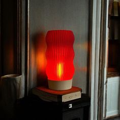 Unique 3D Printed Red Lamp for Stylish Interiors - Modern Design and Soft Lighting for Any Room. This one-of-a-kind lamp is the perfect accent for any modern home. The vibrant red shade, crafted using 3D printing technology, adds a bold touch to your decor, while the soft light creates a cozy and relaxing atmosphere. It's an ideal choice for anyone looking for an original lighting solution for their bedroom, living room, or workspace. Features: *High-quality materials: The lampshade is made from Table Lamp Modern, Lampe Art Deco, Art Deco Lamp, Deco Lamp, Red Lamp, Printed Table, Modern Desk Lamp, Relaxing Atmosphere, Art Deco Lamps