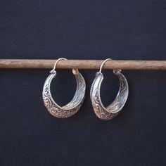 A fine example of traditional Nevari people hand formed silver hoops Approximately 1.5 inches in diameter Artisan Silver Round Hoop Earrings, Traditional Small Hoop Earrings For Festival, Traditional Round Hoop Earrings Nickel Free, Artisan Handmade Silver Hoop Earrings, Traditional Nickel-free Hoop Earrings, Traditional Round Nickel-free Hoop Earrings, Traditional Engraved Round Hoop Earrings, Traditional Small Hoop Sterling Silver Earrings, Traditional Round Hoop Earrings For Festivals