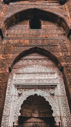 an intricately carved archway in the middle of a building