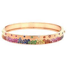 18K Rose Gold Bracelet with Multi-Color Gemstones and Diamonds 23 Blue Sapphires - 0.48 CT 5 Diamonds - 0.06 CT 8 Green Garnets - 0.16 CT 18 Orange Sapphires - 0.40 CT 33 Pink Sapphires - 0.76 CT 13 Yellow Sapphires - 0.32 CT 18K Rose Gold - 18.64 GM SIZE - 16 CM The artisans and designers at Althoff Jewelry also create stunning bracelets that are sure to captivate. These bracelets showcase exquisite craftsmanship and unique color combinations, combining 18K Yellow gold with gemstones such as sa Pink And Orange Jewelry, Orange Jewelry, Green Garnet, Unique Color Combinations, Jewelry Accessories Ideas, Orange Sapphire, Accessories Ideas, Rose Gold Bracelet, Yellow Sapphire