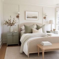 a bedroom with white walls and neutral decor