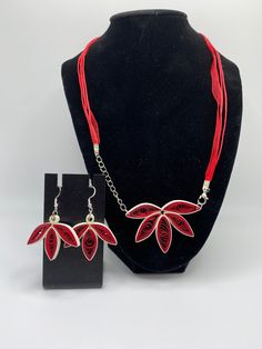 "You're looking at Quilling Unique Paper Quilling Necklace and Earrings set, Jewelry, floral red, Valentines Gift A unique handmade paper quilled Necklace and earrings . Give your loved one a special gift with this beautiful set which are made using the ancient art of quilling. This is where one uses strips of paper which are rolled, shaped, and glued into decorative designs. These sets would be perfect for a special occasion like as : Birthday, Valentine's Day, Mother's Day, Wedding, anniversar Quilling Rose, Quilling Necklace, Quilling Earrings, Quilled Jewellery, Set Jewelry, Paper Jewelry, Necklace And Earrings Set, Paper Quilling, Valentines Gift