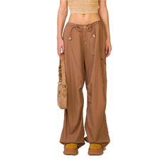 SMFK Compass Wild Viper Cargo Pants Khaki - Design: SMFK's wide-leg paratrooper pants designed in 2022, the 2024 version has increased the loose degree and is set as mid-low waist. - Care: Professional care and dry cleaning needed Size (in cm) Waist Hip Length XS 91 132 102 S 95 136 104 M 99 140 106 L 103 144 108 Materials: 100% Nylon Techwear Style Wide Leg Parachute Pants With Cargo Pockets, Brown Wide-leg Cargo Pants For Streetwear, Loosely Fitted Cargo Style Wide Leg Parachute Pants, Baggy Brown Wide-leg Cargo Pants, Loosely Fitted Wide Leg Cargo Parachute Pants, Brown Wide Leg Parachute Pants With Side Pockets, Fall Streetwear Wide Leg Pants With Cargo Pockets, Techwear Wide Leg Cargo Parachute Pants, Brown Parachute Pants For Spring Streetwear