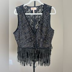 Western Meets Bohemian Glam. Stunning Beaded Vest With Lace Back. Hook And Eye Closure. Excellent Condition. Never Worn. Spring Beaded Fitted Vest, Spring Fitted Beaded Vest, Bohemian Beaded Tops For Night Out, Fitted Beaded Vest For Spring, Fitted Embellished Vest For Fall, Fitted Beaded Tops For Festival, Bohemian Fitted Vest For Party, Fitted Bohemian Vest For Party, Spring Fitted Tops With Beaded Fringe