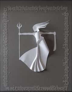 an image of a paper cut out of a woman holding a sceptacle with the word india written on it