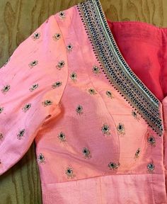 Hand embroidered ready made saree blouse / crop top/stitched saree blouse usa / onion pink saree blouse/modern blouse/zardosi blouse/elbow sleeve saree blouse/ pure silk blouse/ light pink maggam work blouse            Well..!! we understand that you may not get in your desired size/pattern, here you go with customization according to your size/pattern which we can deliver in 1-2 weeks of time period !!      Here is a beautiful Hand embroidered zardosi work crop top / blouse in peach pink color that has deep V neck with hand knot embroidered border and butis all over sleeves and necks as shown!! This is saree blouse has elbow sleeves with butis all over the body , Runs with any self or contrast color saree !! Please message us for any color / size customization !!       Fabric : pure raw s Hand Embroidery Blouse, Ready Made Blouse, Maggam Blouse, Hand Embroidered Blouse, Traditional Blouse Designs, New Blouse Designs, Sari Blouse Designs, Blouse Designs Indian, Simple Blouse Designs