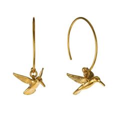 Two elegant hummingbirds gently hover beneath a pair of hoop earrings! Inspired by nature, the earrings are handcrafted in London at Alex Monroe's workshop. Cold Hard Facts: metal: sterling silver + 22K gold vermeil dimensions: 18mm x 32mm Bird Earrings, Nature Inspired Jewelry, Hummingbirds, Inspired By Nature, 22k Gold, Gold Vermeil, Nature Inspiration, In London, Hoop Earrings