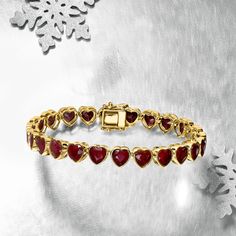 Ross-Simons - 20.00ct t. w. Ruby Heart Tennis Bracelet in 18kt Yellow Gold Over Sterling. 8". An RS exclusive. Rich in color and classic in style, this fiery 20.00 ct. t. w. heart-shaped ruby tennis bracelet is a charming addition to your everyday stacks. Crafted in polished 18kt yellow gold over sterling silver. Double-latch safety. Box clasp, ruby heart tennis bracelet. Ruby birthstones are the perfect gift for July birthdays. Classic Gold Ruby Tennis Bracelet, Elegant Yellow Gold Ruby Tennis Bracelet, Red Gemstone Tennis Bracelet Fine Jewelry, Ruby Gemstone Tennis Bracelet, Luxury Yellow Gold Ruby Bracelets, Ruby Heart, Ruby Birthstone, Ruby Bracelet, July Birthday