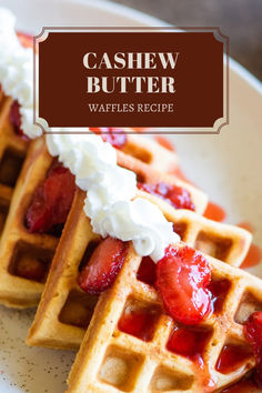 the waffles are topped with strawberries and whipped cream on top for a delicious dessert