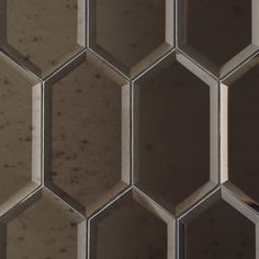 a close up view of some hexagonal tiles