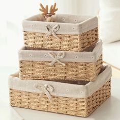 three wicker baskets stacked on top of each other with the words get one free gift