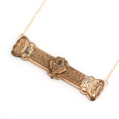 A gold-filled antique bar pin from the Victorian era (circa mid/late 1800s to early 1900s) has been repurposed as a necklace to be more wearable today. This piece of history shows wear from its storied past. Bar pin conversion measures approximately 2 1/4" x 1/2”. New 14k gold-filled chain. Overall necklace length is 16”. Bar pin pendant adds to overall necklace length. If desired, an adjustable chain length may be built into the existing chain to be more versatile, adjustable from 16-17-18 inch Pin Necklace, Antique Bar, The Victorian Era, Pin Pendant, Early 1900s, Victorian Era, Necklace Length, Chain Lengths, Chain Length