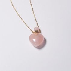 Keepsake Necklace ※ NECKLACE/MATERIAL: You will receive one of the exact items pictured or similar from the same batch, selected at random. Due to the similar nature of these stones we are unable to allow buyers to select their exact pieces at this time. Each piece is guaranteed to be pink rose quartz, though tones and vibrance may vary as depicted in the photos. As is common with natural gemstones, some pieces may have irregularities, hairline inclusions, etc. ※ SIZE/INSTRUCTIONS: Crystal locke Gift Crystal Necklaces With Clavicle Chain And Heart Pendant, Valentine's Day Crystal Necklace With Heart Pendant And Charm, Dainty Necklace For Valentine's Day Keepsake, Spiritual Pink Charm Necklace For Gift, Dainty Heart-shaped Keepsake Necklace, Spiritual Pink Charm Necklace As Gift, Valentine's Day Heart Pendant Crystal Necklace With Heart Charm, Rose Gold Heart Beads Pendant Necklace, Pink Spiritual Charm Necklace For Gift