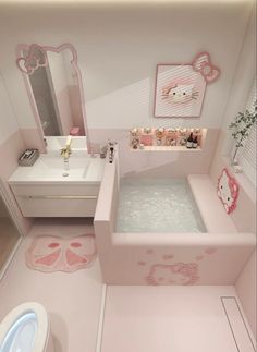 this bathroom has hello kitty decorations on the walls and pink flooring, along with a bathtub