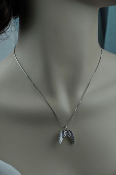 **Made of  925 sterling silver - safe for those with an allergy. Necklace and wing are made of 925 sterling silver, included complete set of wing(1 left, 1 right) as show in the picture.With Stamp S925 Size of each wing: 22mm x 8mmNecklace: 18 inches  These are ready to ship and will arrive in a box, ready for gifting, or to keep for yourself. Winged Sterling Silver Necklace For Gift, Silver Angel Wings Necklace As Gift, Engraved Winged Sterling Silver Jewelry, Wing-shaped Sterling Silver Necklaces For Anniversary, Sterling Silver Wing-shaped Necklace, Sterling Silver Wing-shaped Necklaces For Anniversary, Sterling Silver Wing-shaped Necklace For Anniversary, Silver Angel Wings Jewelry Gift, Silver Angel Wings Jewelry For Gift