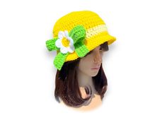 A Crochet Lemon meringue Bucket Hat with Bow and Flower.  This fashion hat will keep you warm season after season or at the very least makes a great hair accessory on bad hair days. This fanny hat is crochet in an acrylic yarn. The light and lofty yarn creates lots of texture without any added bulk or weight. Great for a costume party, a school crazy hat day, Halloween and other Holyday. Fits teen to adult women. * Soft Acrylic Yarn * A lot of different colors on your choice * Decorated with cro Brimmed Sun Hat For Spring, Spring Gift Hat With Short Brim, Fun Yellow Bucket Hat For Spring, Cute Yellow Sun Hat For Spring, Wide Brim Hats As Spring Gifts, Yellow Adjustable Wide Brim Crochet Hat, Spring Gift Wide Brim Hats, Handmade Hats As Spring Gifts, Whimsical Spring Hats For Gifts