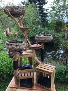 an outdoor sculpture made out of wood and wicker