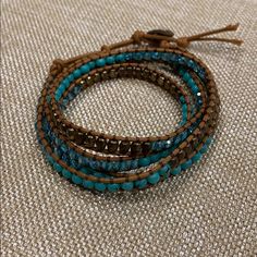 Nwot! Women’s Wrap Around Beaded Bracelet Bracelet Design Wraps Around The Wrist And Closes With A Silver Bead. Measurements Approx 32.5" Min L - X 33.5" Max L X 0.3" W. They Craft The Wrap Bracelet In A Palette Of Colors That Includes Different Shades As Brown, Aqua, Turquoise And Copper-Color Beads. The Bracelet Is Designed To Wrap Around The Wrist Approximately Five Times. Bracelet From Artisan Crafted Beaded Jewelry. Avoid Contact With Water. Button Clasp. Beaded Wrap Bracelets, Bracelet Design, Aqua Turquoise, Beaded Wraps, Silver Bead, Copper Color, Artisan Craft, Bracelet Designs, Wrap Around