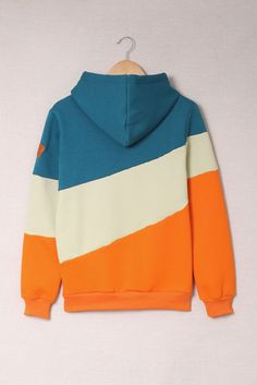 Orange Colorblock Cowl Neck Pullover Hoodie Blue Contrast Color Hoodie For Fall, Cotton Long Sleeve Color Block Hoodie, Casual Fleece Sweatshirt With Contrast Color, Cotton Color Block Long Sleeve Hoodie, Color Block Cotton Hoodie With Long Sleeves, Blue Hooded Hoodie With Contrast Color, Blue Hoodie With Contrast Color For Winter, Casual Multicolor Hoodie With Color Matching, Blue Winter Hoodie With Contrast Color