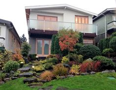 a house with landscaping in the front yard