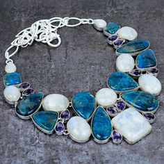 Rainbow Moonstone Blue Apatite Amethyst Silver Plated Necklace, Unique Designer Jewelry, Chunky Necklace, Handmade Jewelry, Choker Necklace Please note : As this stone is natural, texture of every stone is different. so, the product you get in hands may slightly vary from the picture shown and not exact same as picture . And this is the beauty of each necklace being different than other. ♥ Crafted with the help of trained and experienced artisans team ♥ Our products are handmade with quality gem Blue Gemstone Crystal Necklaces, Blue Amethyst Pendant Necklaces, Blue Amethyst Multi-stone Jewelry, Blue Gemstone Crystal Necklace, Blue Moonstone Jewelry With Stones, Blue Amethyst Pendant Necklace, Artisan Blue Necklace With Gemstone Accents, Unique Blue Gemstone Crystal Necklace, Artisan Blue Gemstone Crystal Necklace