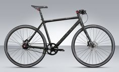 a black bicycle is shown on a gray background