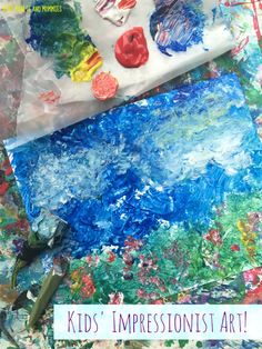 kids'impressionist art is being displayed on a table with scissors and paintbrushes