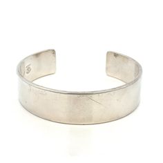 "Designer Richard Kalbe Sterling Silver Wide Cuff Bangle Bracelet  - Modern Silver Bracelet~ ET1417 Metal Content: 925 Sterling Silver Measurements Width:  5/8\" (16mm) Opening: 2.5\"- fits an average wrist Weight: 48.24 Grams Stamped: Richard Kalbe Sterling Condition: Good Pre-Owned- scratches noted to outside surface of cuff.  Please see listing photos Each piece is thoroughly examined and refinished as needed by our professional jewelers, tested to guarantee metal content,  graded by our in-house GIA (Gemological Institute of America) Graduate Gemologist, and inspected for quality before being carefully packaged and promptly shipped. Thank you for taking the time to shop with us! We have hundreds of more listings, with more being added every week! From necklaces to bracelets, the classi Adjustable Open Cuff Bracelet For Formal Occasions, Classic Open Band Cuff Bracelet With Polished Finish, Classic Cuff Bracelets With Polished Finish, Polished Finish Cuff Bracelets For Formal Occasions, Polished Wide Band Bracelet For Formal Occasions, Formal Cuff Bangle With Polished Finish, Classic Adjustable Bracelet With Open Band, Classic Adjustable Open Band Bracelet, Formal Cuff Oyster Bracelet