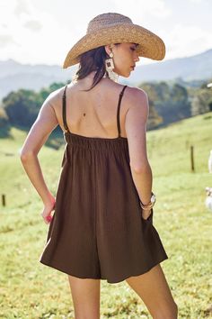 This brown romper features a square neck and sleeveless design, complemented by flared legs for a hint of vintage style. Product code: CAA13F4E022HH Features:  Woven Square neckline Sleeveless Pockets Flared leg Pattern: Faux Texture Wash Method: Regular Wash Material: 100%COTTON. Chic Summer Jumpsuits And Rompers With Square Neck, Casual Square Neck Jumpsuits And Rompers For Beach, Casual Beach Jumpsuits And Rompers With Square Neck, Brown Summer Jumpsuits And Rompers, Casual Beach Jumpsuits With Square Neck, Summer Brown Cotton Jumpsuits And Rompers, Summer Jumpsuits And Rompers With Square Neck, Brown Cotton Jumpsuits And Rompers For Summer, Sleeveless Brown Jumpsuits And Rompers For Summer