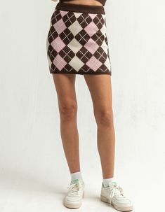 RSQ Argyle Sweater Skirt. Argyle knit skirt with ribbed trim. Approx. length: 17". 100% acrylic. Hand wash. Imported.Model is wearing a size small. Model measurements:Height: 5'9" Bust: 34"Waist: 24"Hips: 34" Casual Knit Mini Skirt, Fitted Knit Bottoms Of Mini Length, Fitted Knit Mini Length Bottoms, Fitted Knit Mini-length Bottoms, Casual Knit Mini Skirt For Fall, Trendy Stretch Knit Skirt, Trendy Knit Stretch Skirt, Casual Knit Mini Skirt For Winter, Casual Winter Knit Mini Skirt