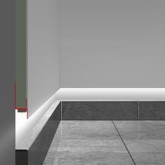 an empty room with tile flooring and red lines on the wall, in black and white