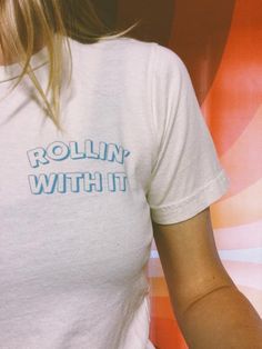 - Rollin' With It Tee - REDWOLF Light Blue T-shirt With Letter Print For Spring, Light Blue Graphic Print T-shirt, Fitted Fun T-shirt With Text Print, Fitted Fun T-shirt With Screen Print, Retro White Print Crew Neck T-shirt, Spring Fun Graphic T-shirt, Funny Blue Graphic Print T-shirt, 90s Style Blue T-shirt With Text Print, Unisex Retro T-shirt With Text Print