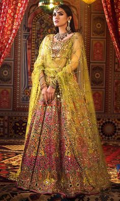 Pakistani Bridal Mehndi Lehnga Choli with Magnificent Look emblazoned with beautiful embroidery. Buy Pakistani Bridal Lehnga Choli Online in USA. Festive Jamawar Lehenga With Dabka Work, Yellow Kundan Sharara With Intricate Embroidery, Navratri Kundan Gown With Intricate Embroidery, Wedding Lehenga With Intricate Embroidery In Jamawar, Bollywood Style Jamawar Dupatta For Reception, Festive Anarkali Lehenga In Jamawar, Bollywood Style Jamawar Sharara For Reception, Bollywood Jamawar Gown With Dabka Work, Wedding Lehenga With Dupatta In Jamawar