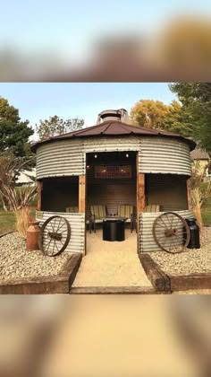 an old grain silo with wheels on it