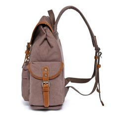 Set forth on your daily journey with the Shady Cove Backpack, a meticulously handcrafted piece that marries the ruggedness of adventure gear with the finesse of artisanal craftsmanship. Constructed from high-quality cotton canvas and adorned with genuine leather accents, this backpack symbolizes durability wrapped in elegance. It reflects your dedication to an eco-friendly and style-conscious way of life. | TSD Brand Shady Cove Backpack, Brown Travel Bags With Leather Trim And Adjustable Fit, Brown Backpack With Adjustable Strap For Outdoor Activities, Beige Rectangular Backpack For Outdoor, Beige Backpack For Outdoor Activities, Brown Backpack With Adjustable Strap For Outdoor, Rugged Brown Backpack For Outdoor, Brown Large Capacity Backpack For Outdoor Activities, Brown Functional Backpack For Adventure, Vintage Backpack With Adjustable Strap For Adventure