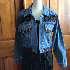 Denim Jacket With Beaded Trim With Black Braid Never Worn From A Boutique Spring Denim Jacket With Beaded Fringe And Long Sleeves, Trendy Beaded Fringe Fall Outerwear, Spring Beaded Denim Outerwear, Embellished Medium Wash Denim Jacket For Fall, Bohemian Dark Wash Denim Jacket For Fall, Bohemian Blue Denim Jacket For Fall, Bohemian Beaded Outerwear For Fall, Bohemian Beaded Fall Outerwear, Casual Beaded Denim Jacket